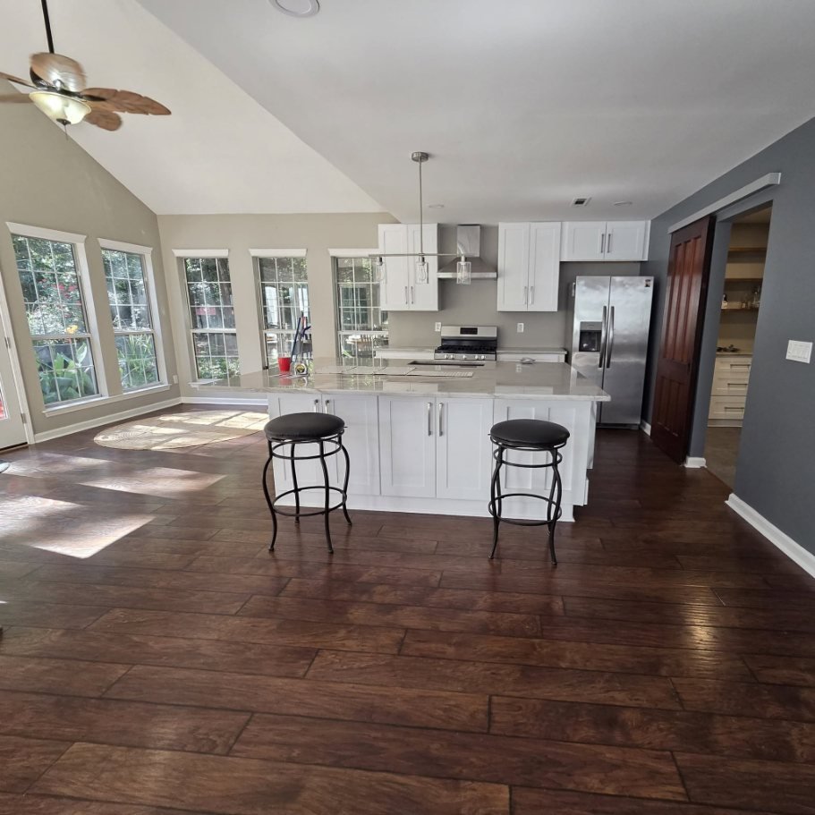 Kitchen remodel with white shaker cabinets and quartz island in Newnan GA