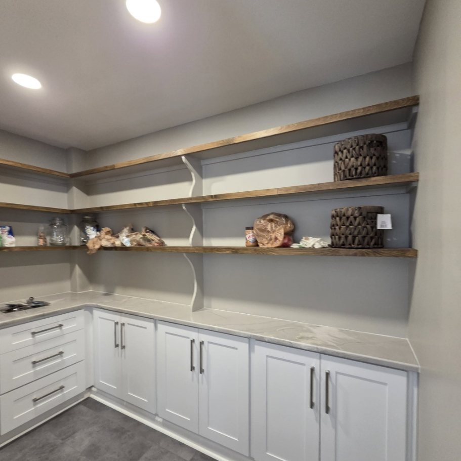 Walk-in pantry with floating shelves